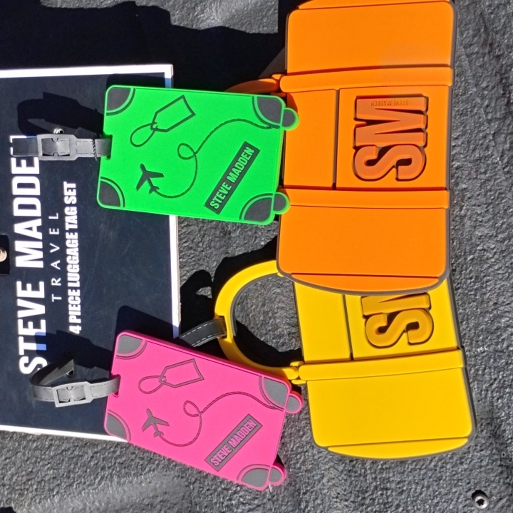 Steve Madden four piece luggage tag set